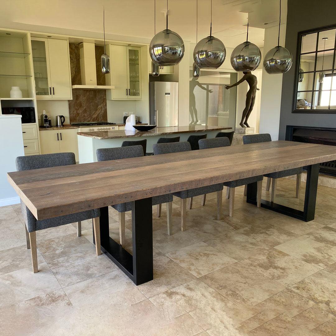 Auriel features a 70mm thick ,  Top made in Recycled Oregon Pine ,  The legs are made in steel powder coated Black.