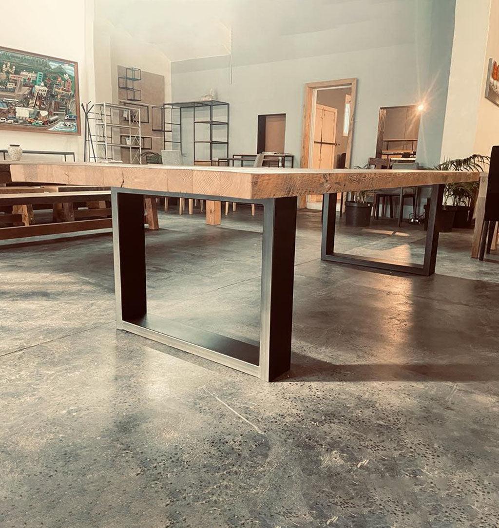 Auriel features a 70mm thick ,  Top made in Recycled Oregon Pine ,  The legs are made in steel powder coated Black.