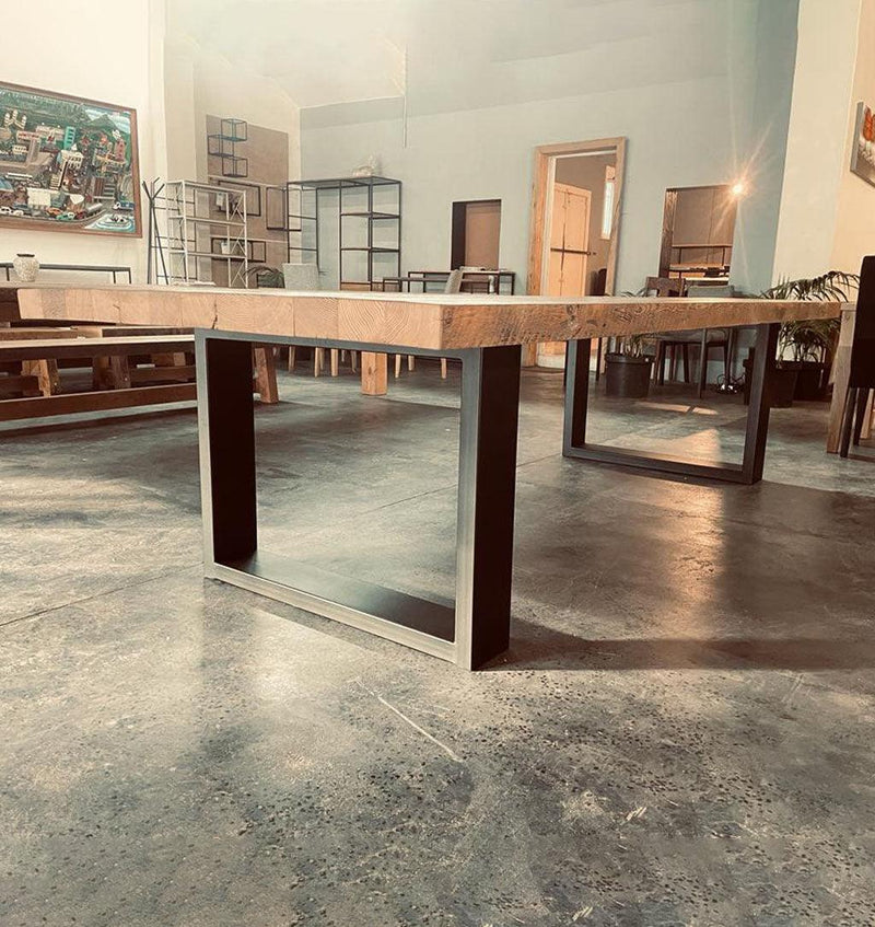 Auriel features a 70mm thick ,  Top made in Recycled Oregon Pine ,  The legs are made in steel powder coated Black.